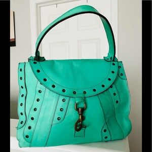 Cute and roomy green bag.